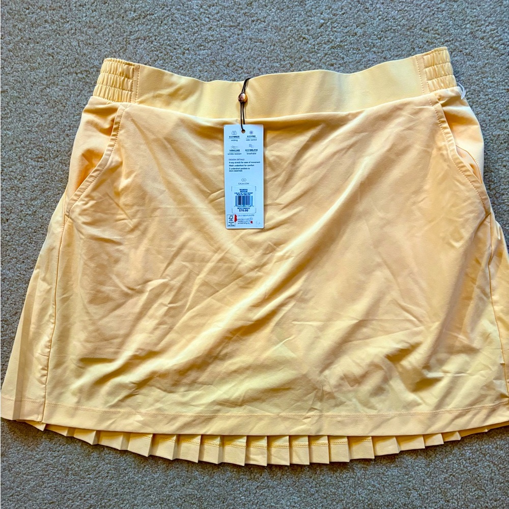 CALIA by Carrie Underwood Light Yellow Pleated Hem Mini Skort